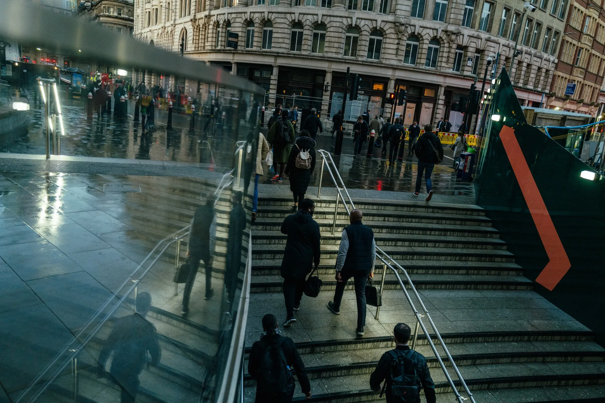 Morning commuters exit Liverpool Street railway station in the City of London.