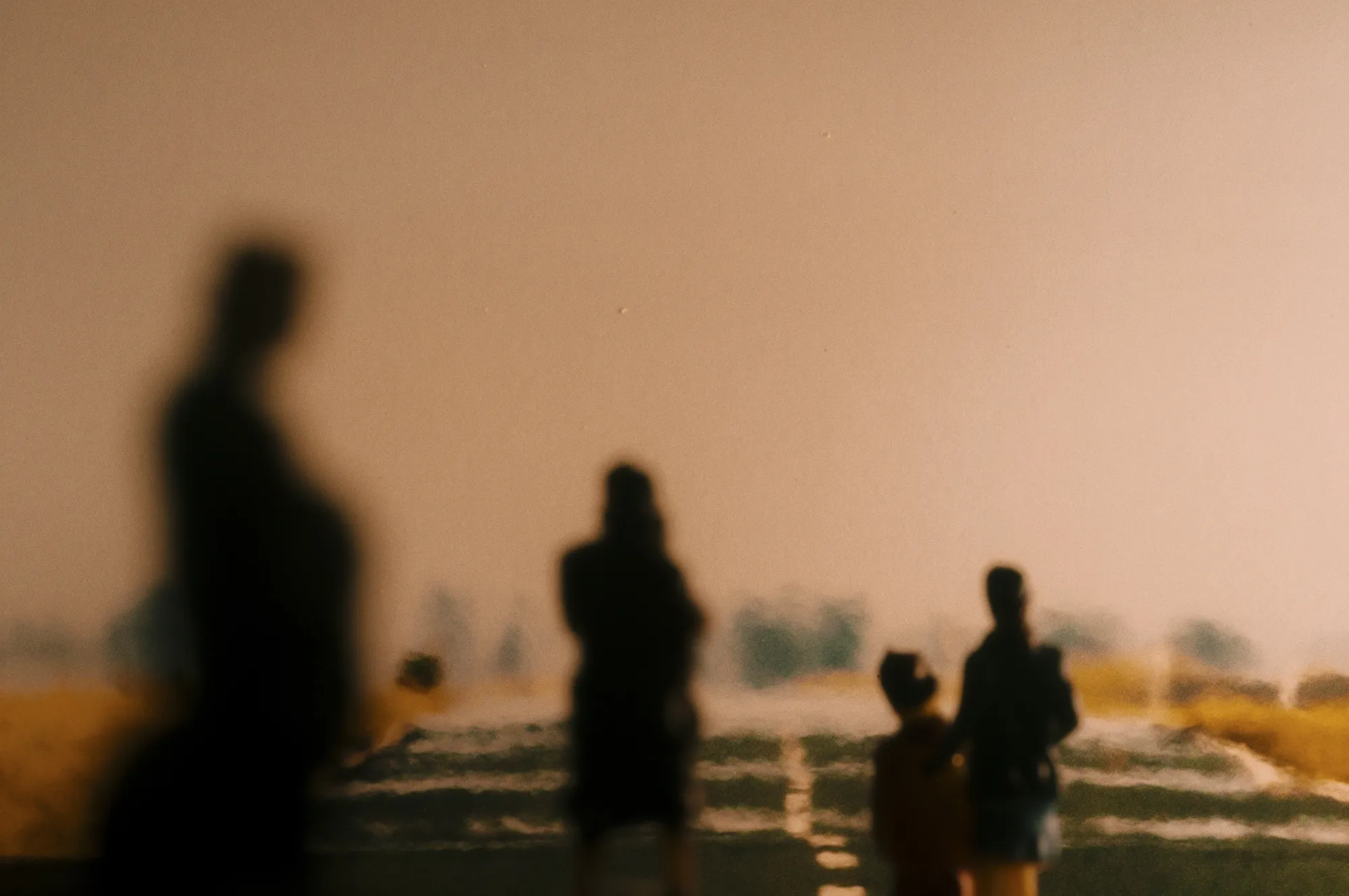 A still life of pedestrians during a heatwave.