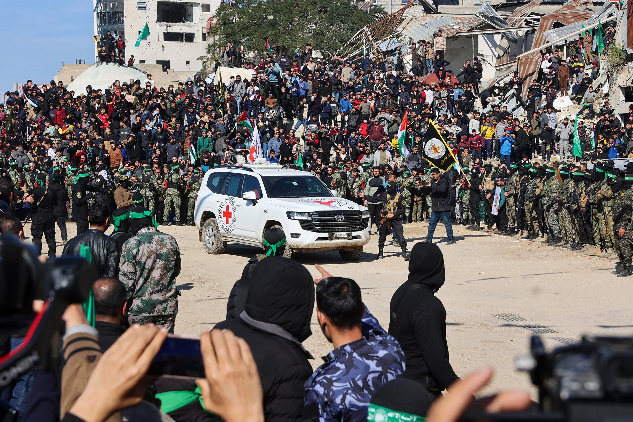 A Red Cross vehicle arrives in a square&nbsp;before the release of four Israeli hostages in Gaza City, on Jan.&nbsp;25.