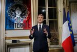 Emmanuel Macron delivers his New Year wishes during a televised address to the nation from the Elysee Palace in Paris on Dec. 31.