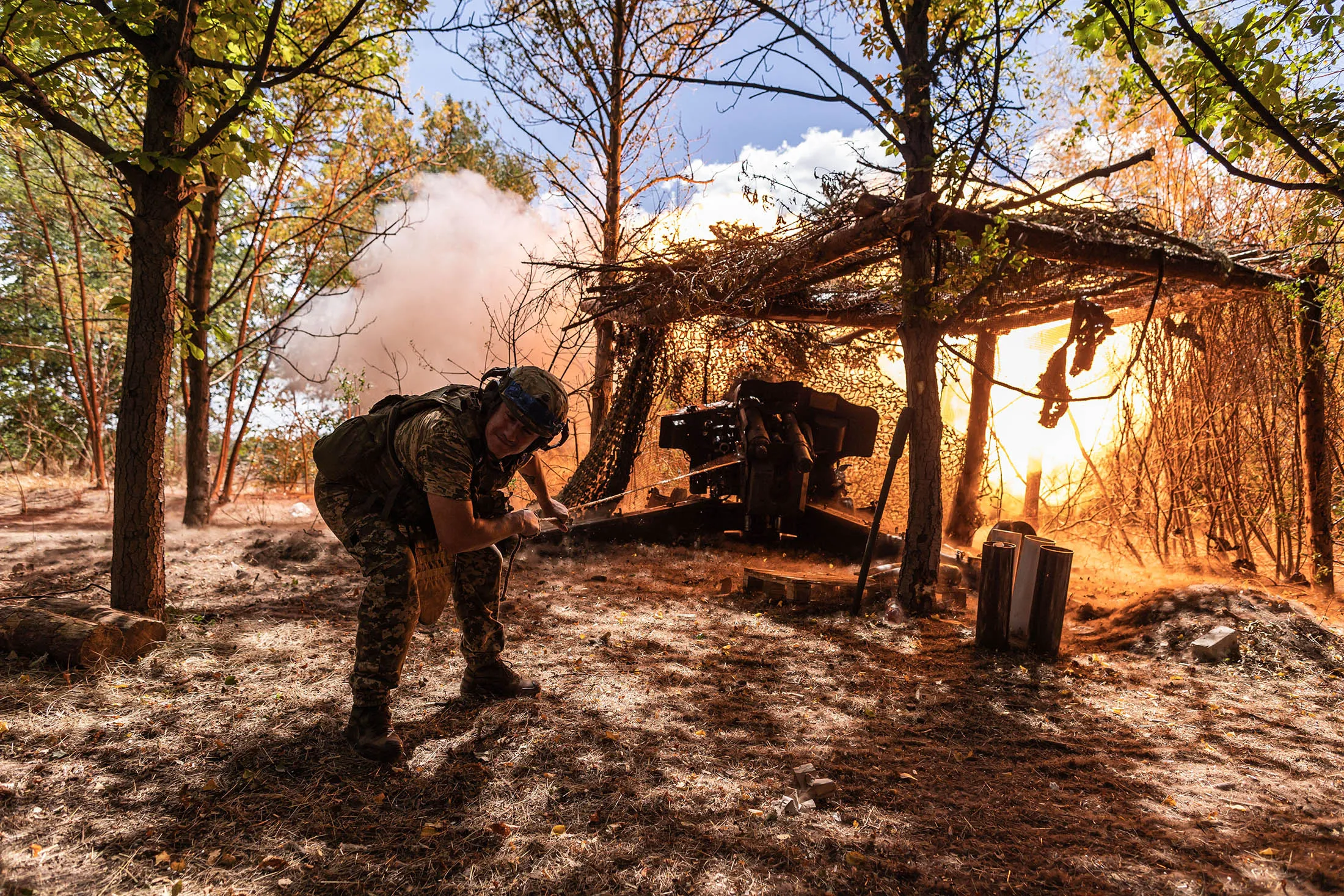 Ukrainian soldiers fire a D-20 artillery in the direction of Toretsk, Ukraine, on July 24.