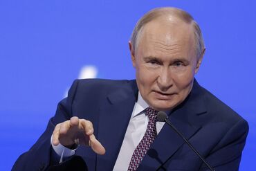 TOPSHOT-RUSSIA-BUSINESS-PUTIN