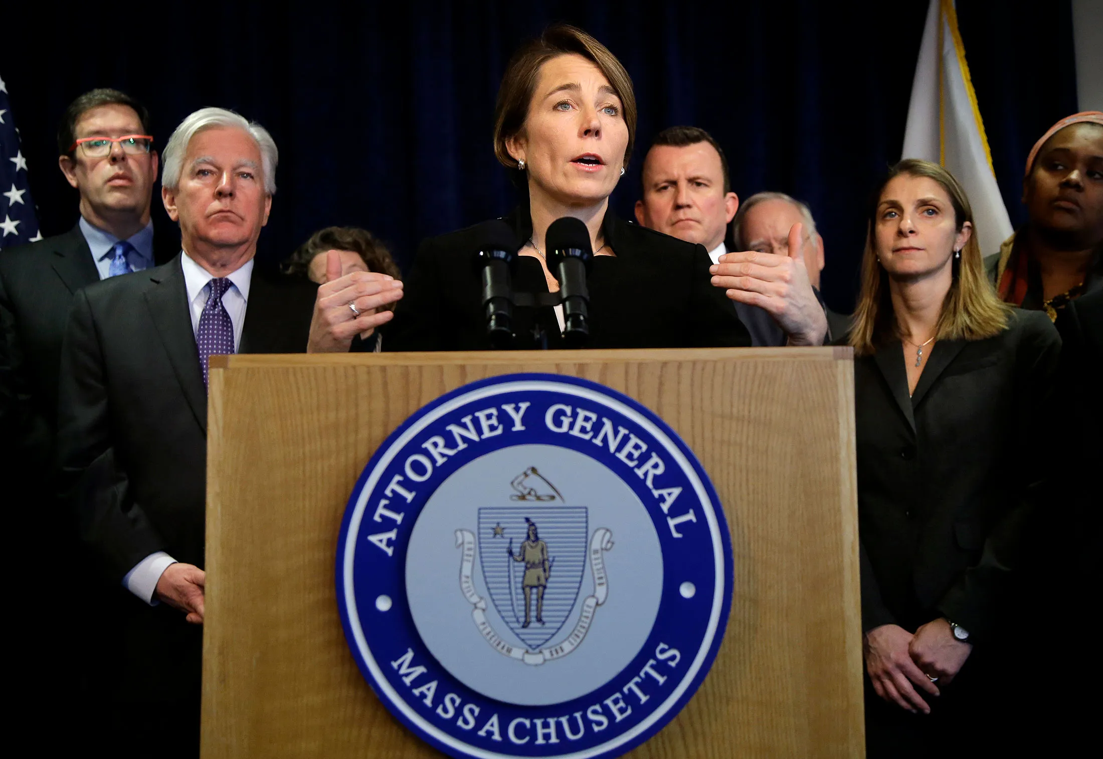 Massachusetts Attorney General Maura Healey, center, takes questions from reporters during a news conference on, Jan. 31, in Boston. Healey is joining a lawsuit filed by the American Civil Liberties Union of Massachusetts challenging President Donald Trump's executive order on immigration.
