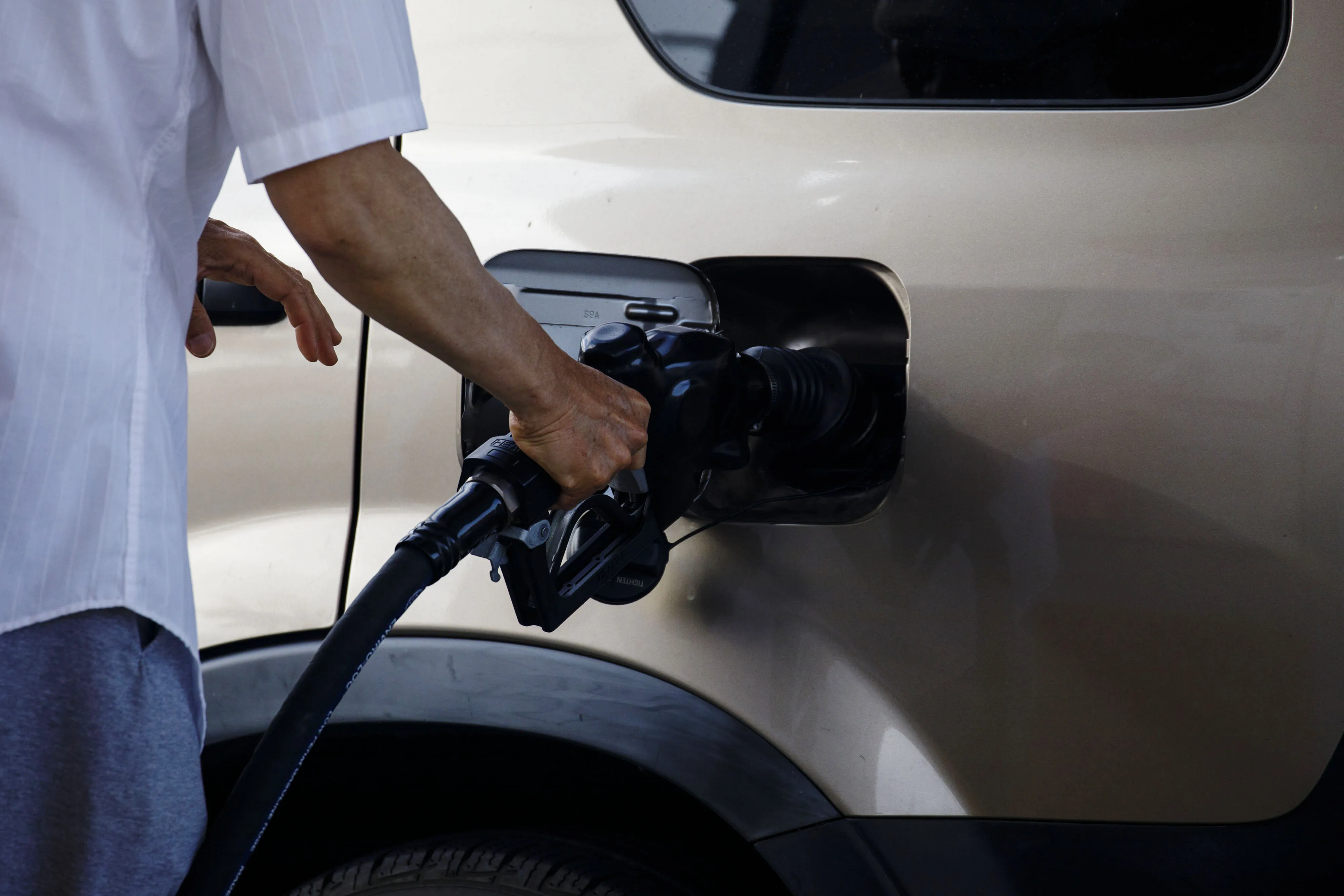 A customer refuels a vehicle at a Royal Dutch Shell Plc gas station in Redondo Beach.