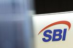 The group logo of SBI Holdings Inc. displayed at a reception area of the company's head office, in Tokyo, Japan. 