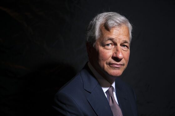Jamie Dimon Boosts JPMorgan Wealth Advisers’ Pay From Windsor Castle