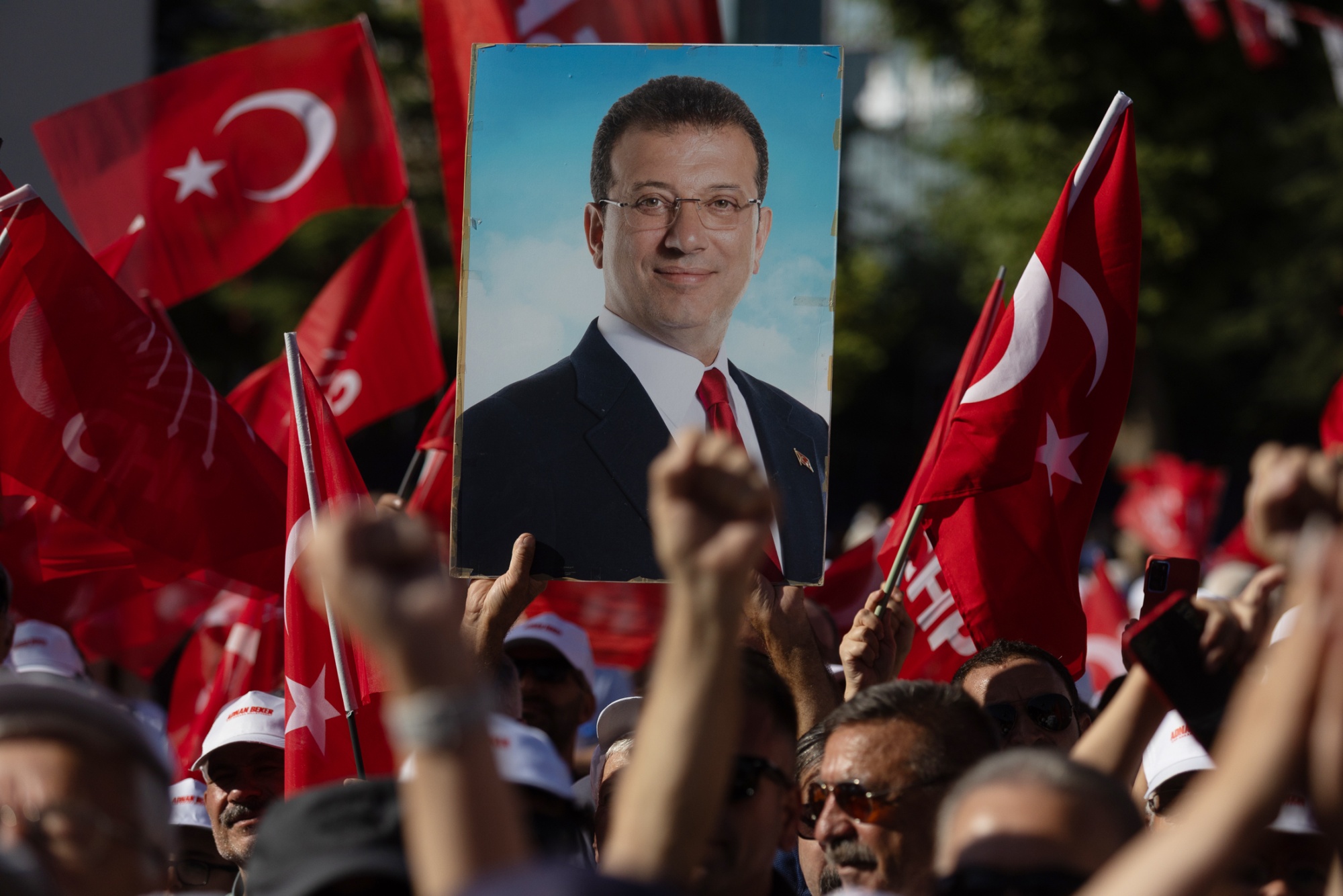 Supporters hold a poster of Ekrem Imamoglu during a rally in Ankara in 2025. Photographer: Serdar Ozsoy/Getty Images