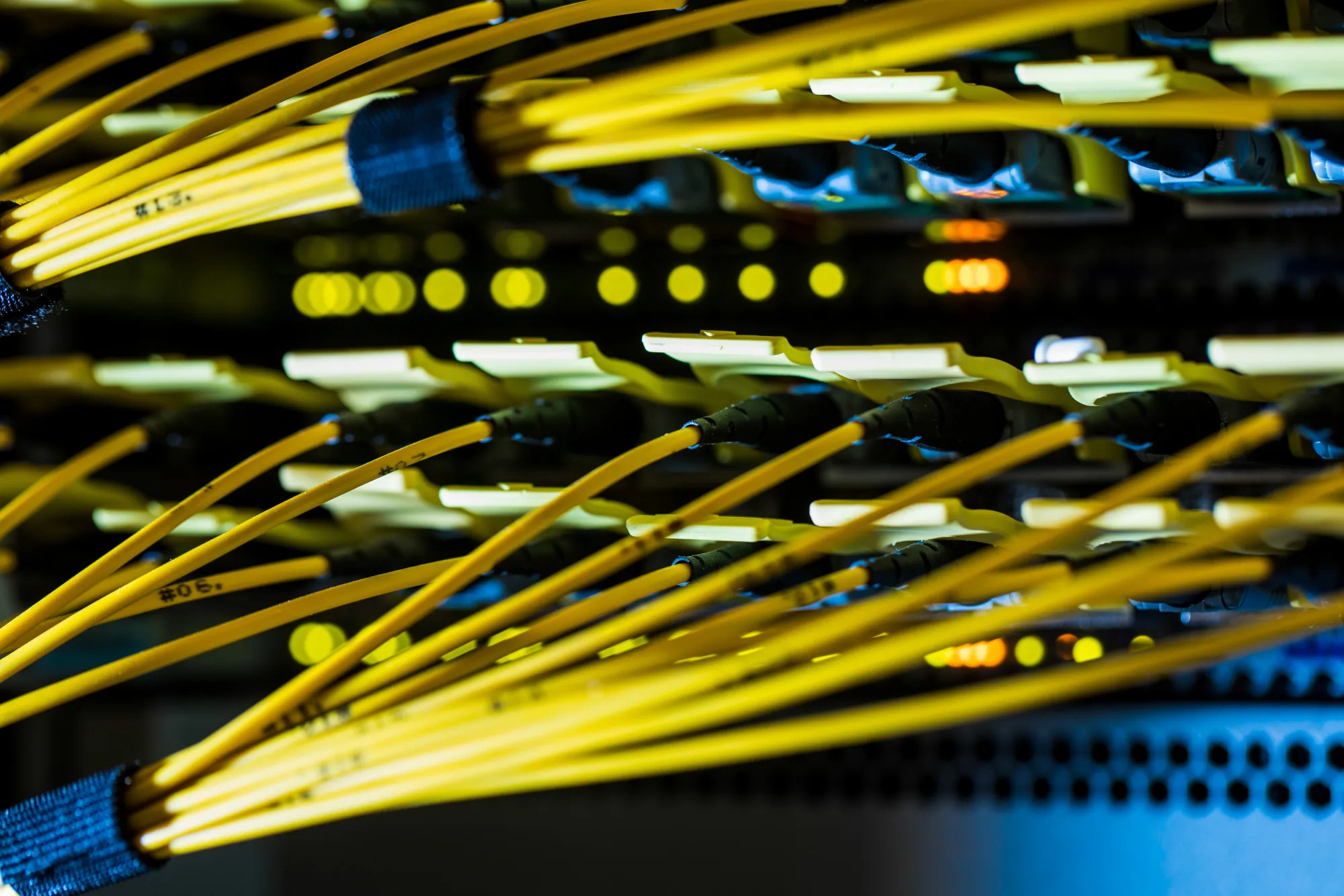 Fiber optic cables feed into a switch