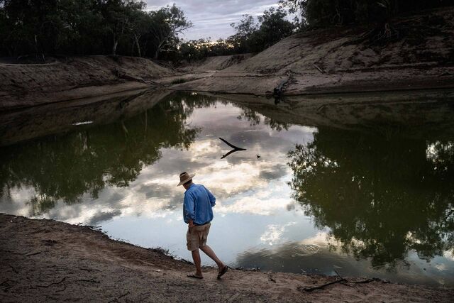 Robert McBride walks along the Darling River that runs through Tolarno Station near Menindee in NSW, Australia on Feb. 25, 2020. Tolarno is owned by McBride and his been in his family since 1851.