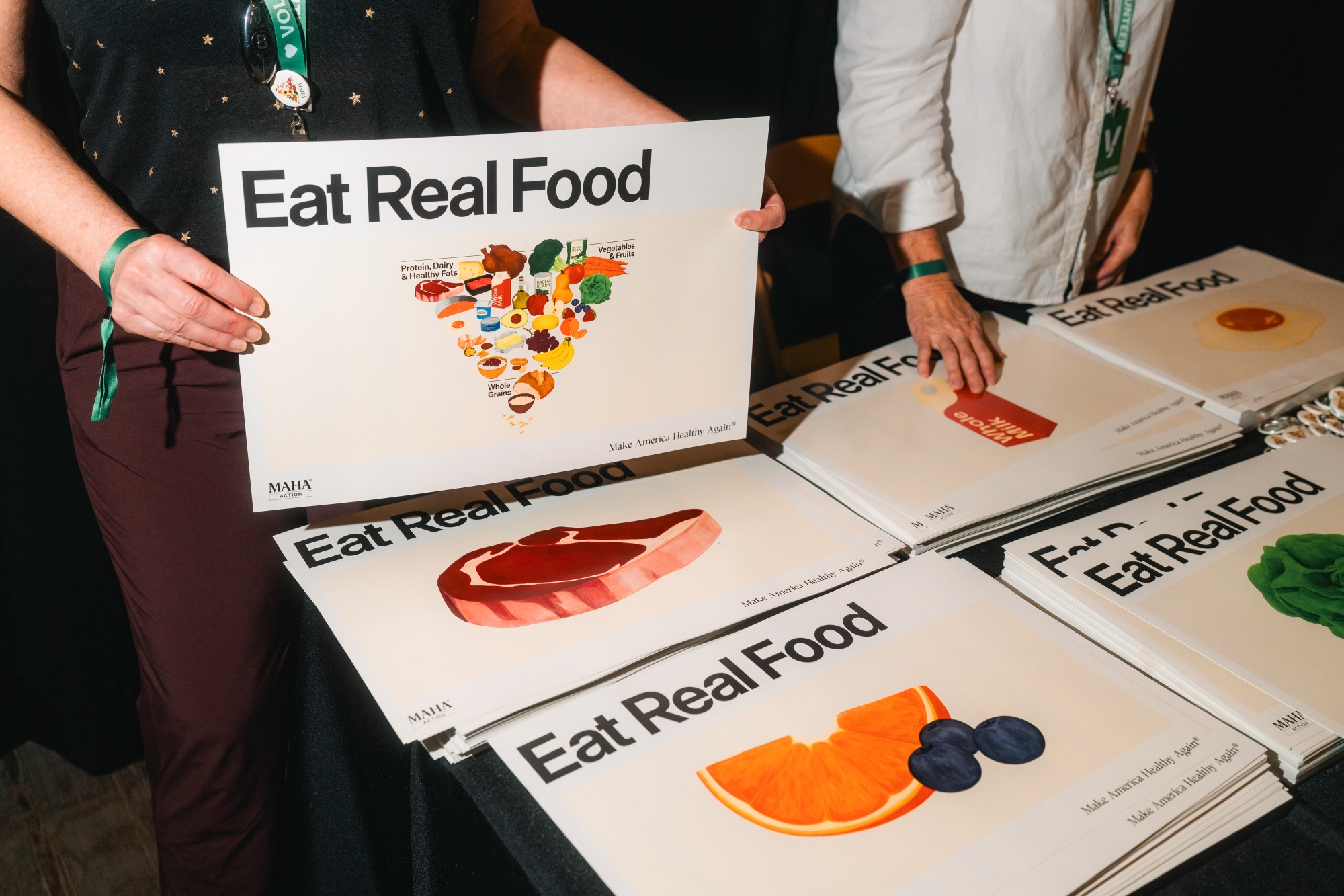 "Eat Real Food" signage during an "Eat Real Food" rally at Brazos Hall in Austin, Texas, US, on Thursday, Feb. 26, 2026. The Trump administration last month released updated nutrition guidelines that bring back a revamped version of the food pyramid, while urging people to eat less sugar and more animal-based protein. Photographer: Jordan Vonderhaar/Bloomberg