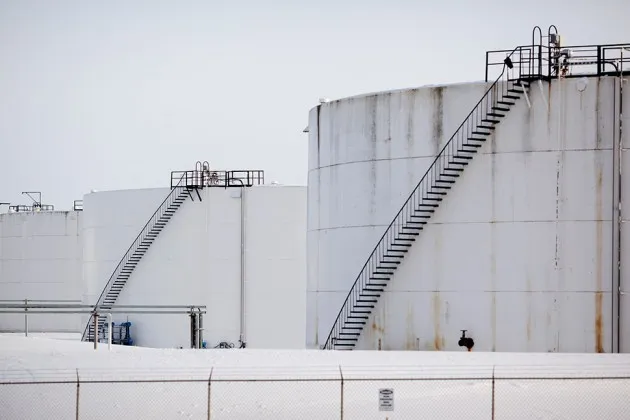 Oil tanks stand at the Hardisty tank farm, which includes the TransCanada Hardisty Terminal 1, in Hardisty, Alberta, on Dec. 7, 2013