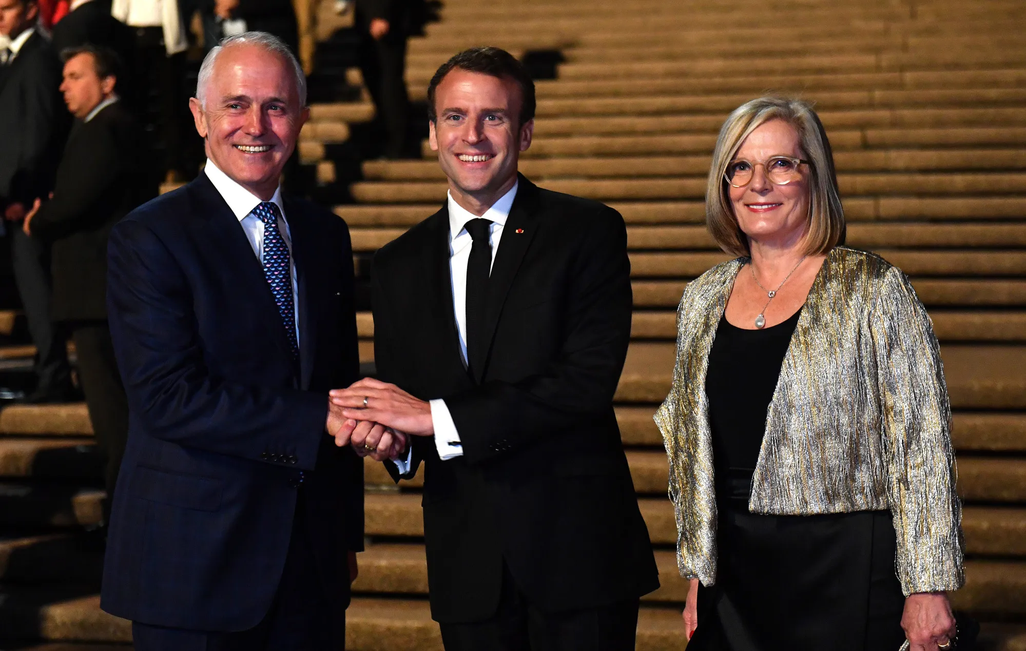 Emmanuel Macron, center,&nbsp;and Malcolm Turnbull and his wife Lucy Turnbull at the Sydney Opera House on May 1.