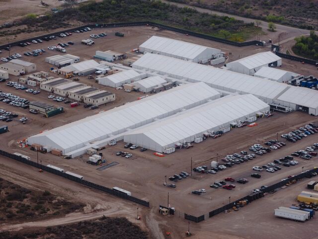 An overview photo of the Firefly migrant processing center. 