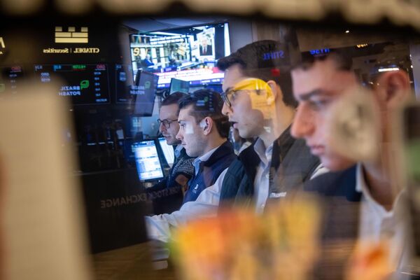 Traders work on the floor of the New York Stock Exchange (NYSE) in New York, US