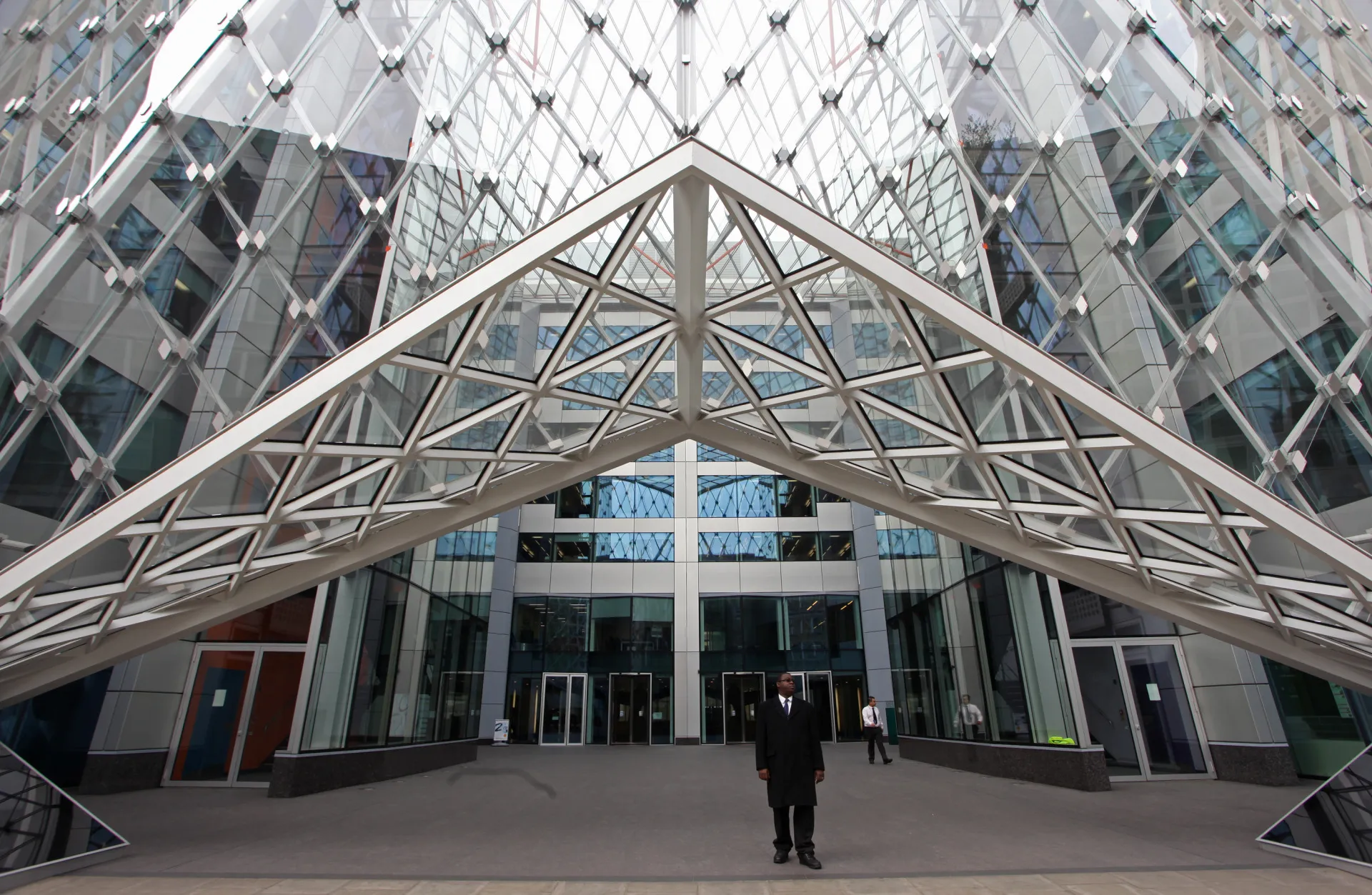 A security guard stands outside 55 Baker Street, the building housing the offices of Brevan Howard Asset Management LP, in London, U.K.