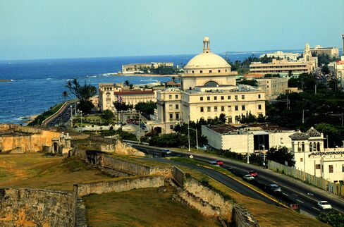 John Paulson Says Puerto Rico Will Be Singapore of Caribbean