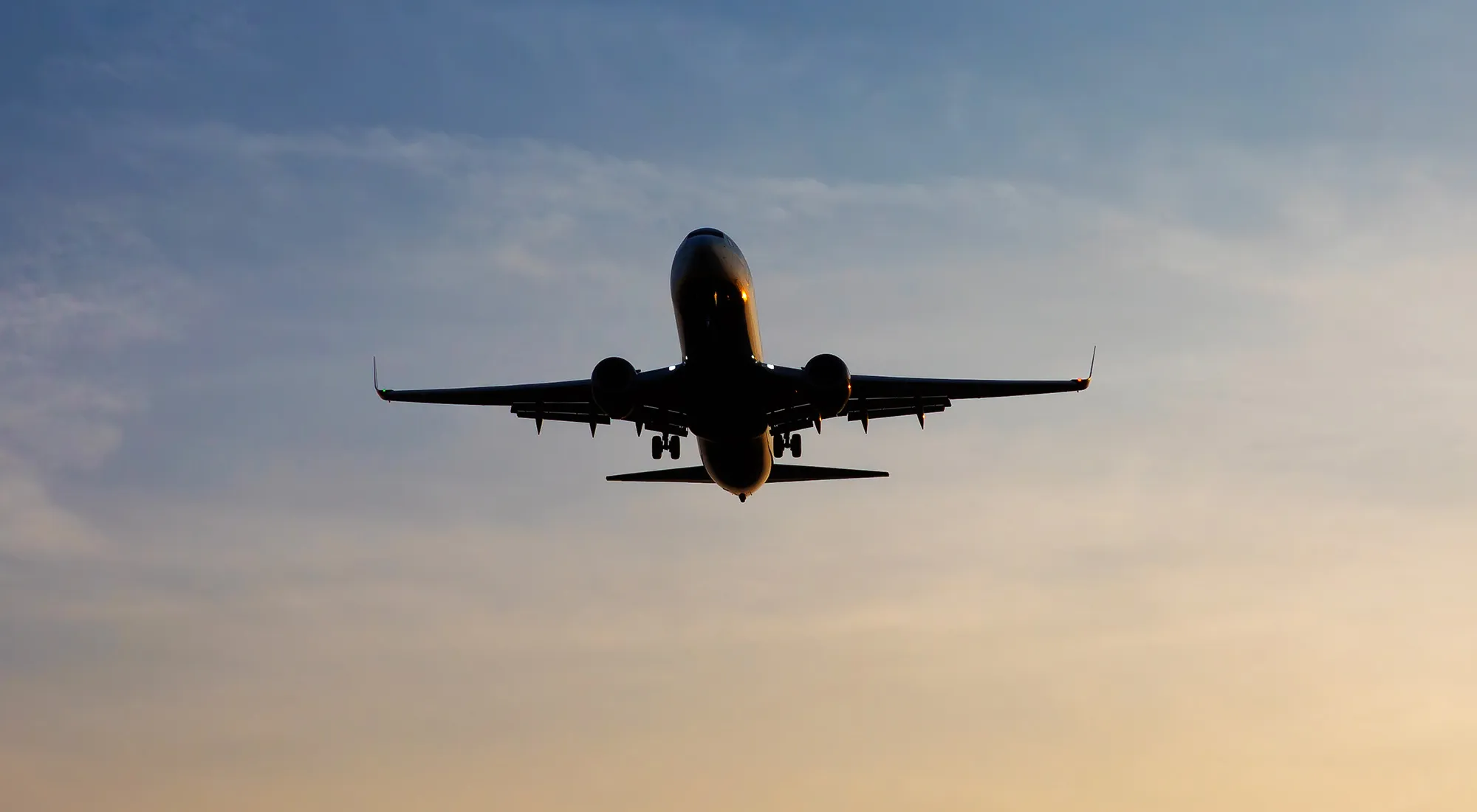 Aircraft in the sky at sunset (Schönefeld, Brandenburg/ Germany)