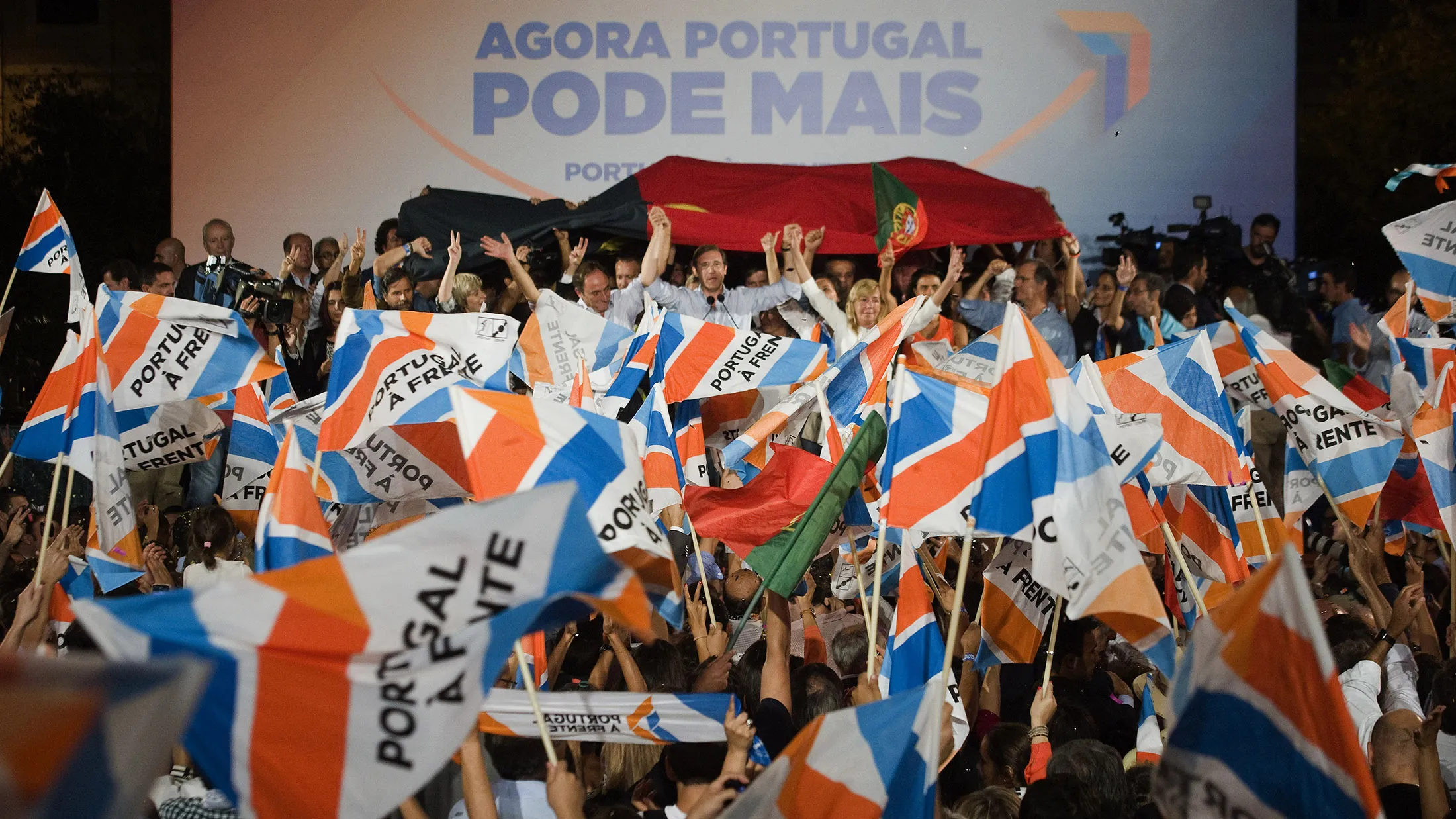 Pedro Passos Coelho, Portugal's prime minister, gestures while speaking to supporters.
