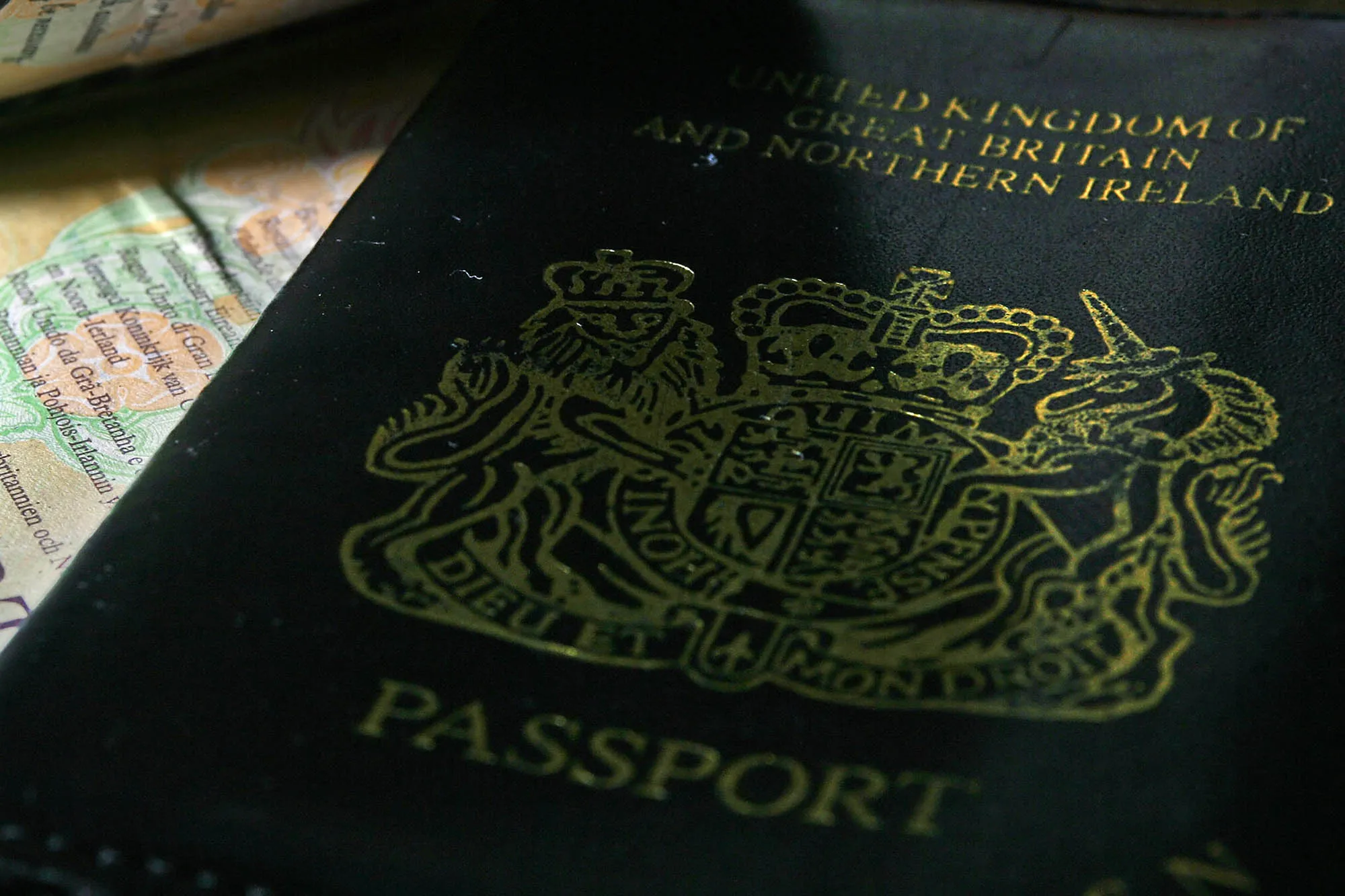 A passport for a citizen of the United Kingdom of Great Britain and Northern Ireland is pictured in London, on July 23, 2008. Members of the Public and Commercial Services Union (PCS) working for the Identity and Passport Service (IPS) will began a three day strike Wednesday, in the latest industrial action over the government’s policy to cap public sector pay and close offices. The three day stoppage, hitting the UK's seven regional passport offices and 68 interview offices, will lead to the cancellation of passport interviews and delay the issuing of passports during one of the busiest periods of the year. AFP PHOTO/Leon Neal (Photo credit should read Leon Neal/AFP/Getty Images)
