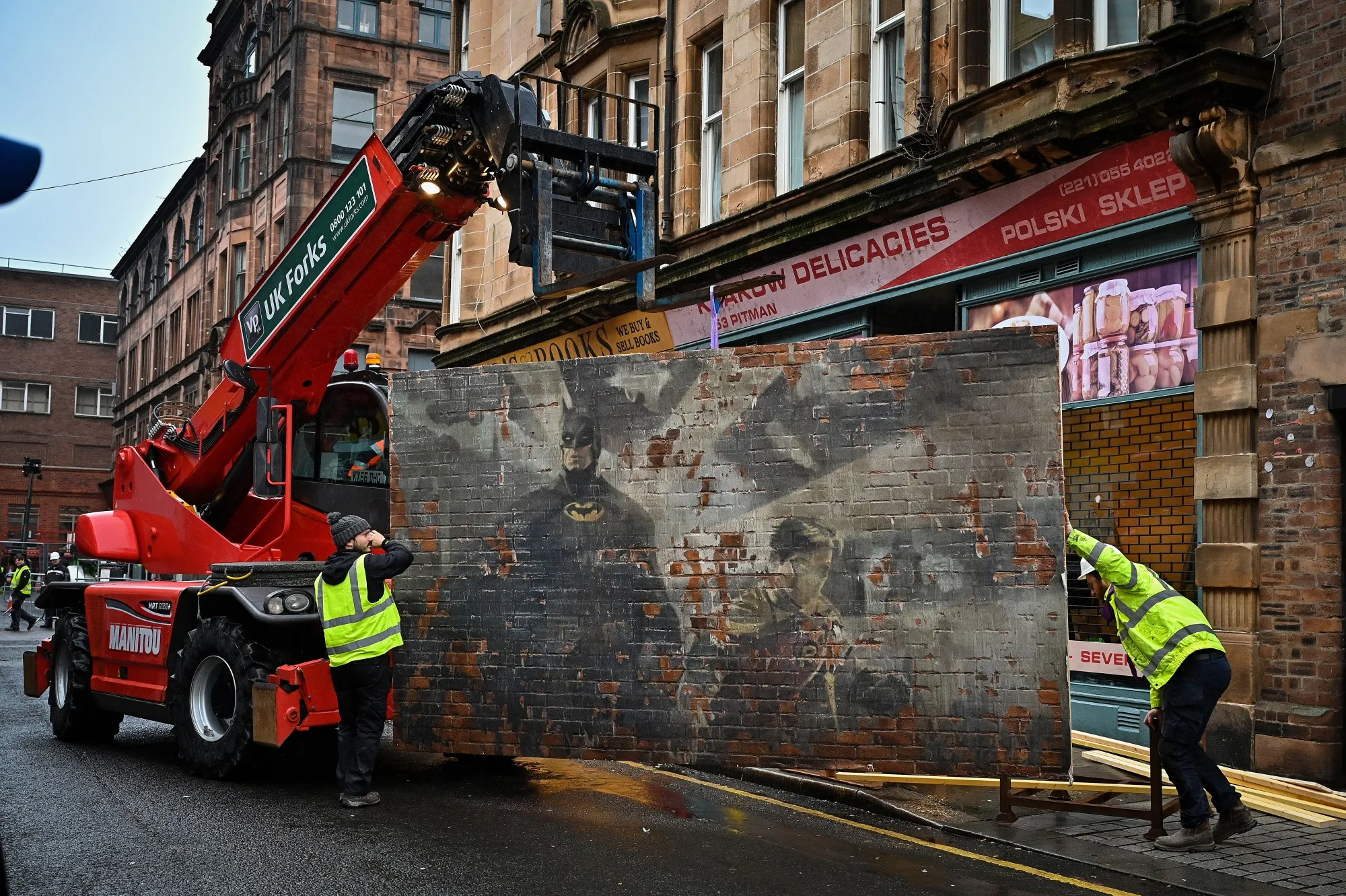 Crew dress the set of the new Batgirl movie in Glasgow.