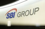 The group logo of SBI Holdings Inc. displayed at a reception area of the company's head office, in Tokyo.