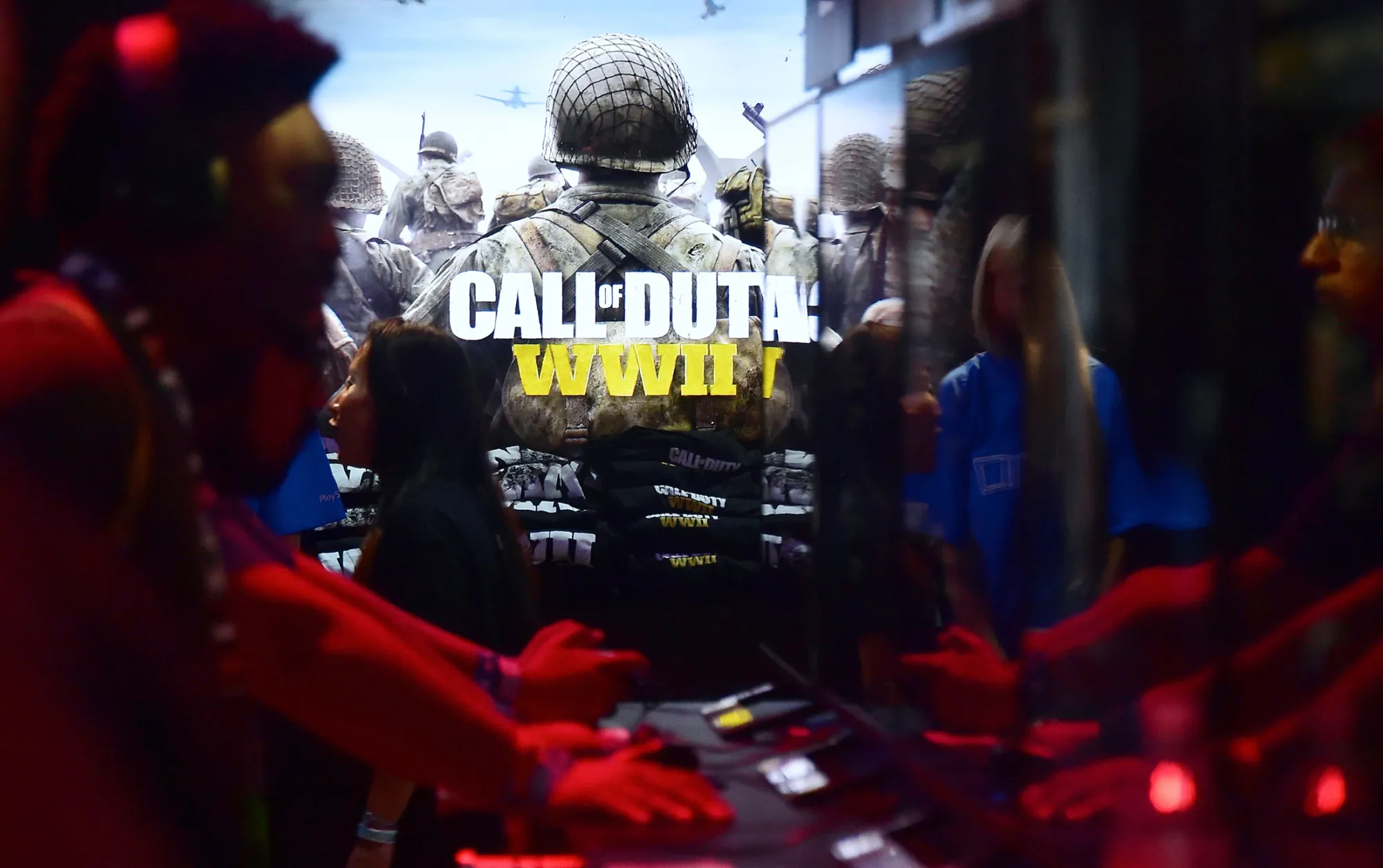 Gamers play "Call of Duty WWII" at E3 2017 in Los Angeles on June 13, 2017.