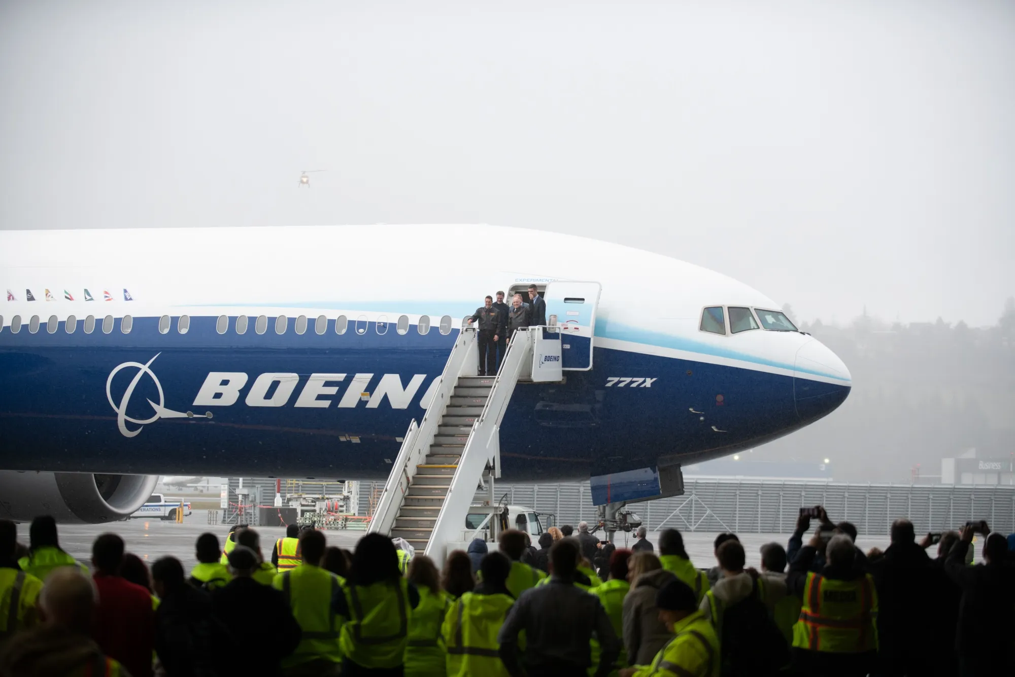 Pilots exit a Boeing 777X airplane after a test flight in Seattle, Washington.