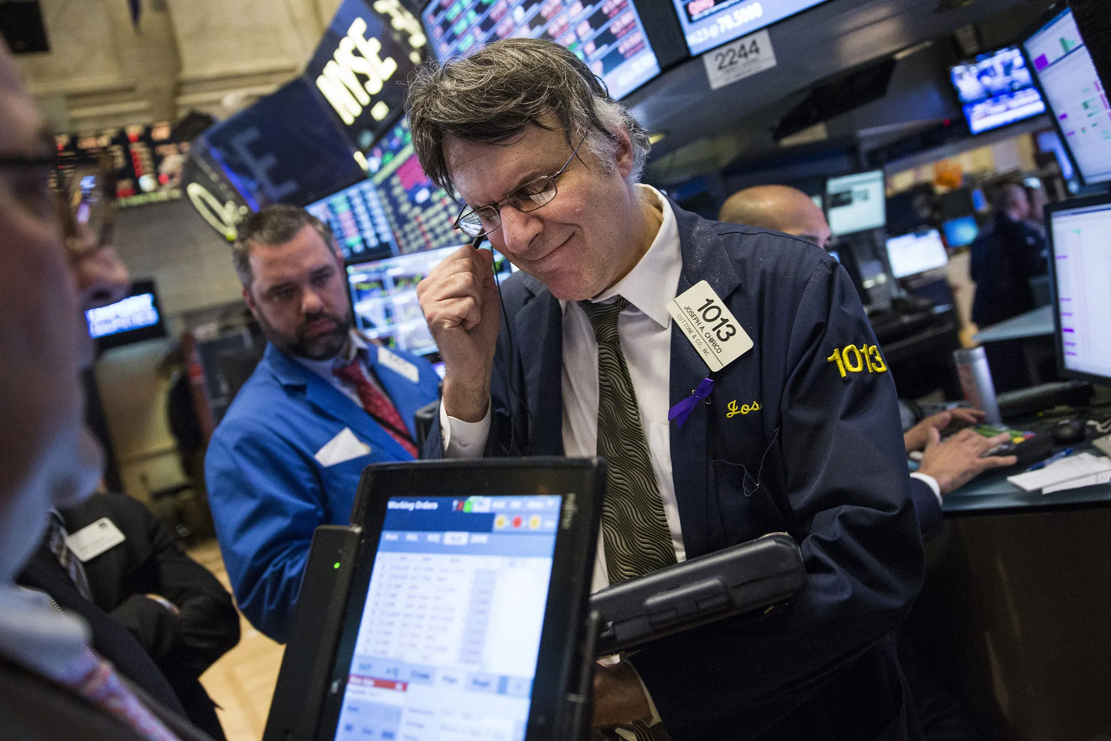 Traders work on the floor of the New York Stock Exchange during the afternoon of April 17, in New York City.
