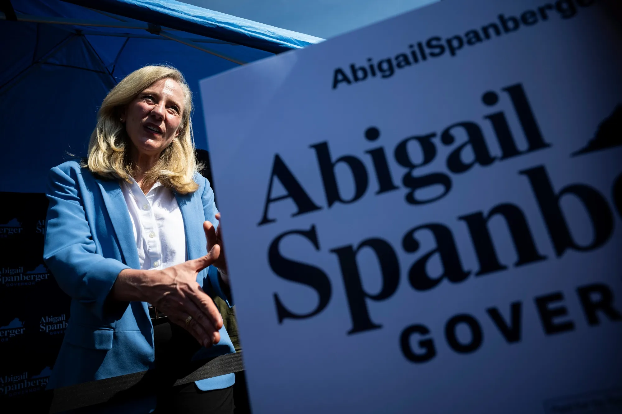 Former Representative Abigail Spanberger&nbsp;greets voters&nbsp;on the first day of early voting in Fairfax, Virginia.