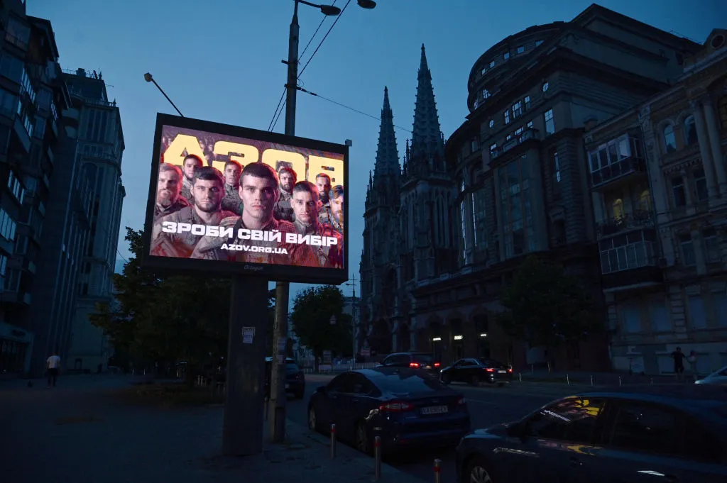 A recruiting placard during a partial electricity blackout in the center of Kyiv.