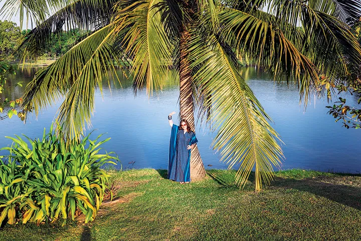 The author—in a caftan—in Bangkok’s Wachira Benchathat Park.
