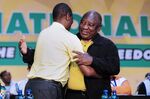 Paul Mashatile, South Africa's deputy president, embraces Cyril Ramaphosa, during the African National Congress party in Johannesburg, South Africa, on Dec. 19.