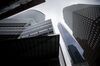 Goldman Sachs Group Inc. headquarters, left, and American Express Tower, right, stand in New York, U.S., on Friday, March 1, 2019. A rally in shares of technology companies helped push the broader U.S. equity market up from the lows of the day. Treasuries fell for a third day and oil slumped.