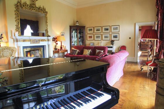For Sale: The $14 Million Irish Manor House Paid for by Lady In Red