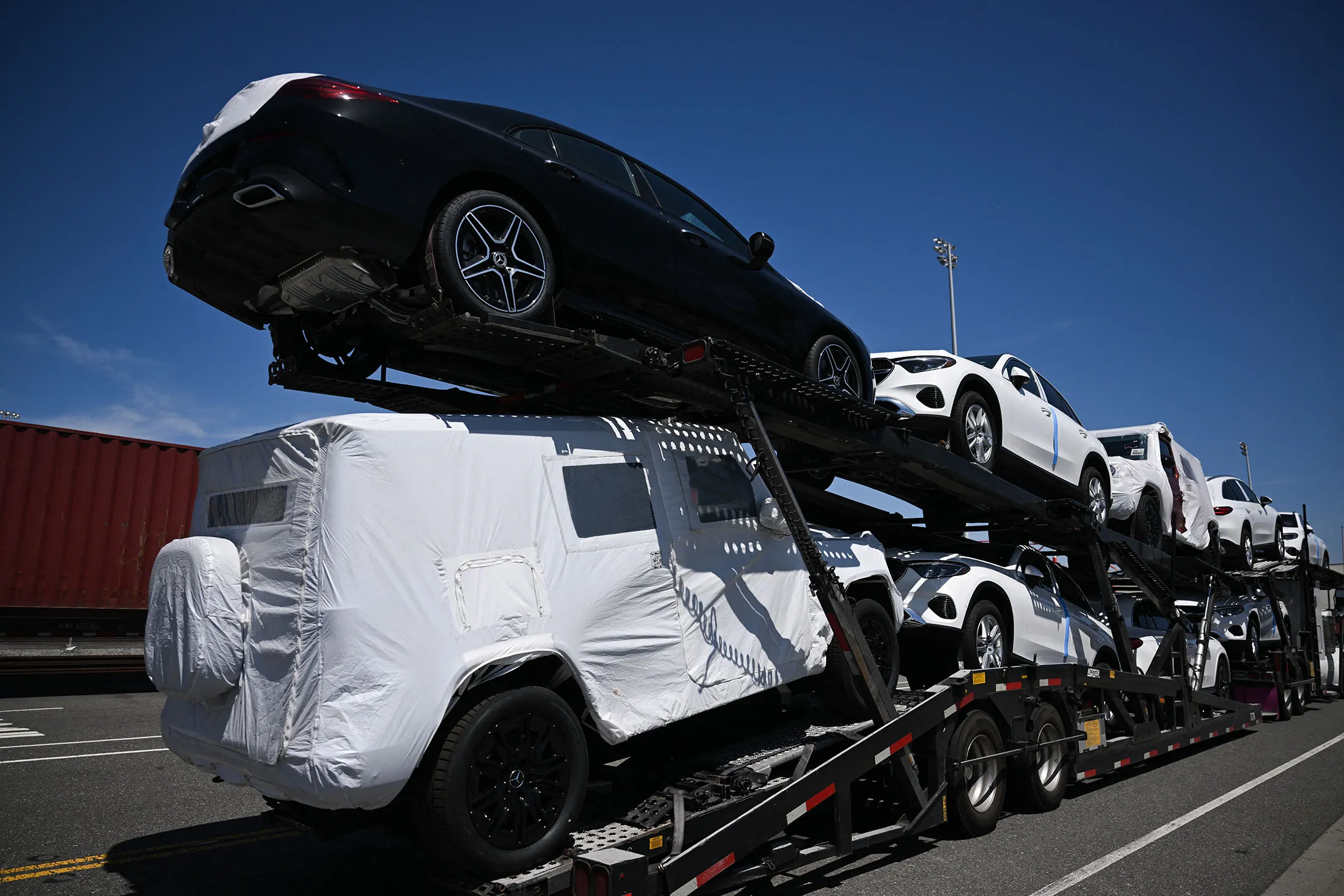 Mercedes-Benz SUVs are unloaded at the Port of Long Beach in California.