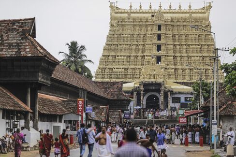 Devotees outside the Sree Padmanabhaswamy temple in Trivandrum, India. Photographer: Dhiraj Singh/Bloomberg