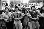 Students link arms during a demonstration against police brutality in May 1975, following the beating of a Chinese American in Manhattan Chinatown a month earlier.