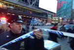 Police respond to a report of an explosion near Times Square on .. (AP Photo/Charles Zoeller)