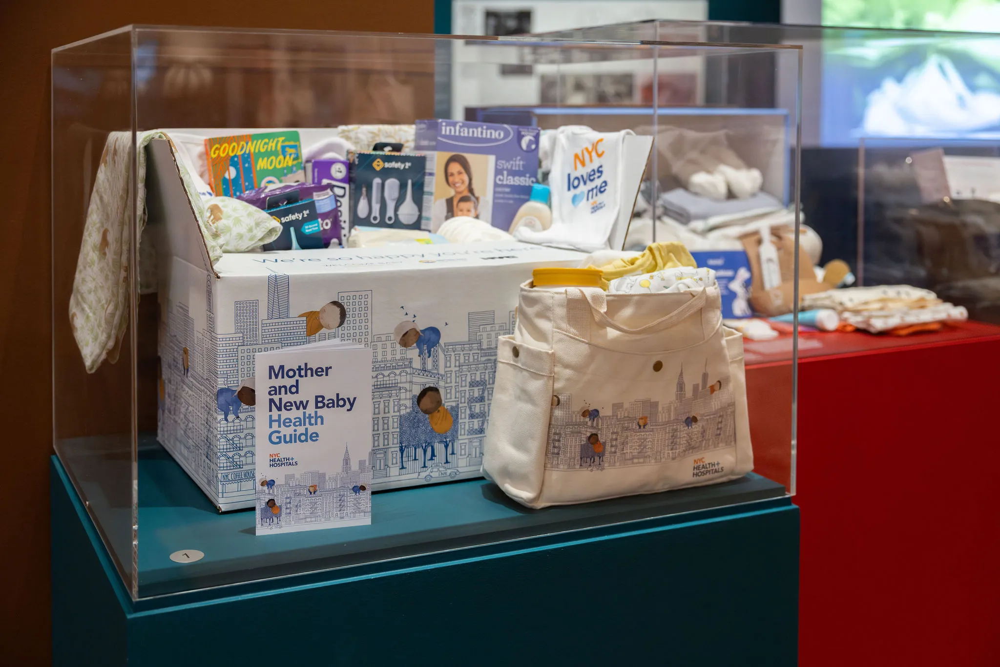 
An installation view of NYC Baby Box offerings on view in “Designing Motherhood,” an exhibit at New York’s Museum of Arts and Design.
