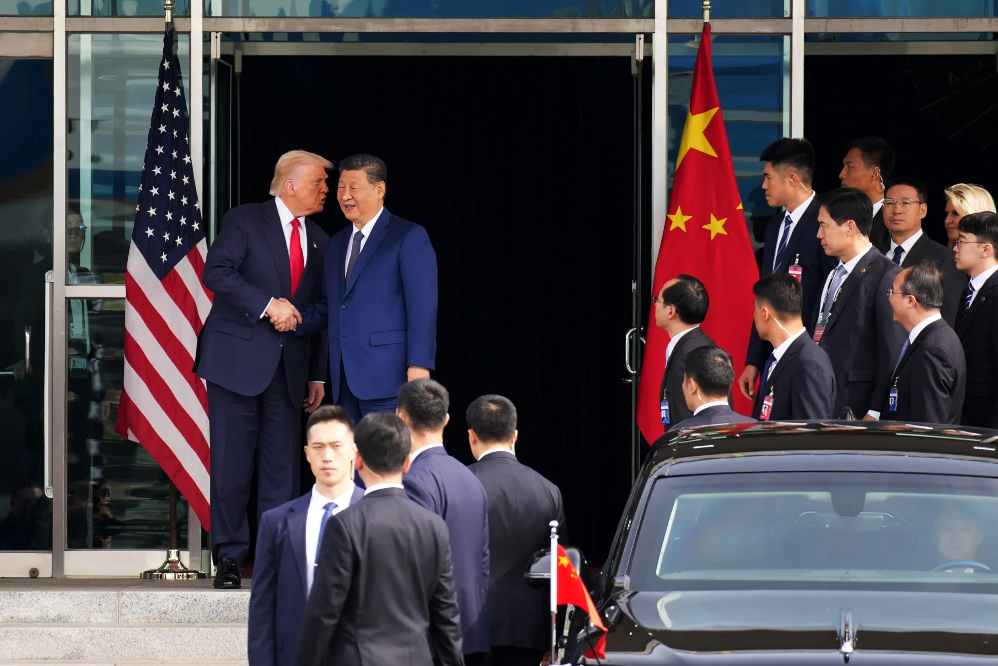 Donald Trump and Xi Jinping shake hands following a bilateral meeting&nbsp;in Busan, South Korea, Oct. 30.