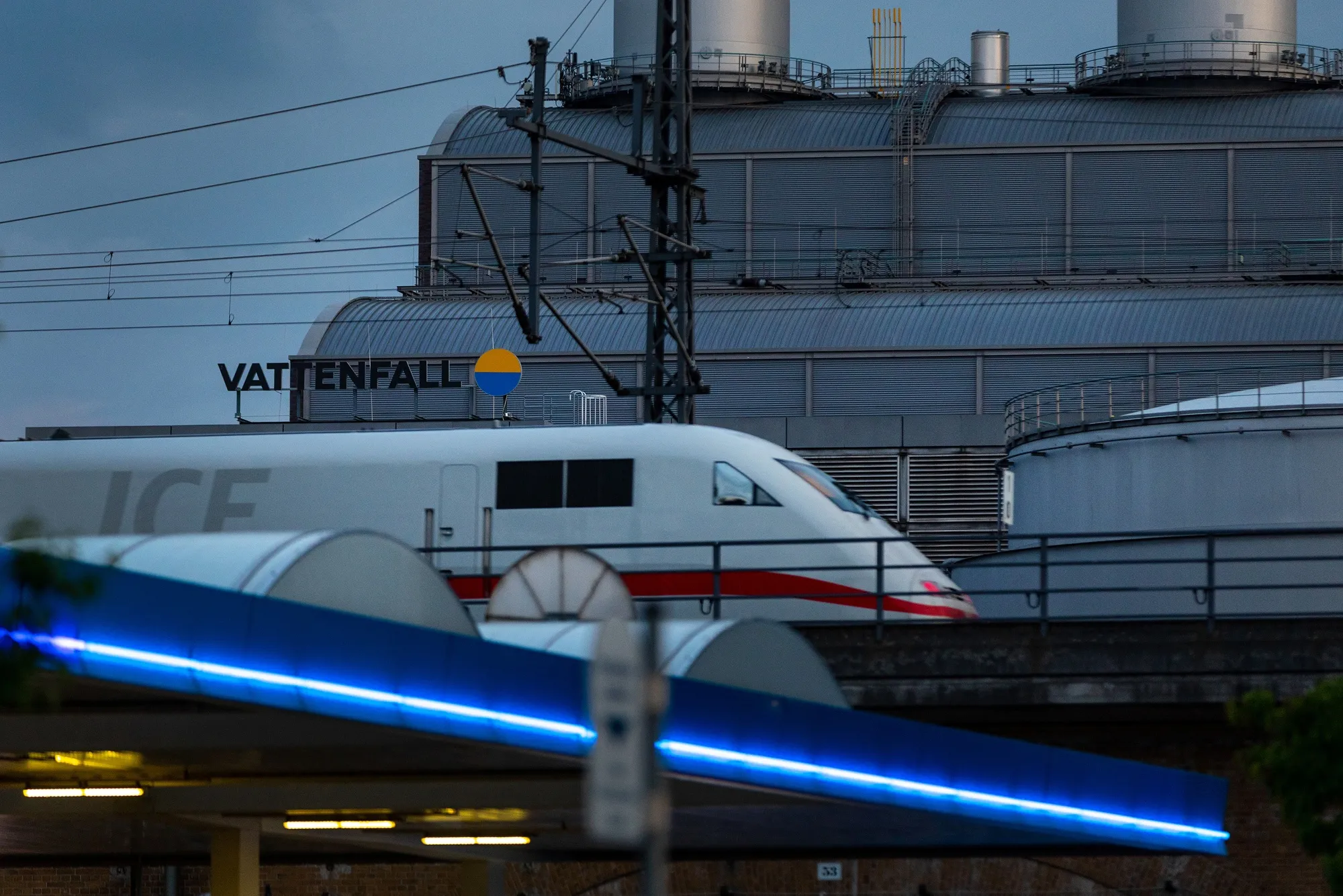 A train passes the Mitte Combined Heat and Power (CHP) natural gas power plant, operated by Vattenfall AB, in Berlin.
