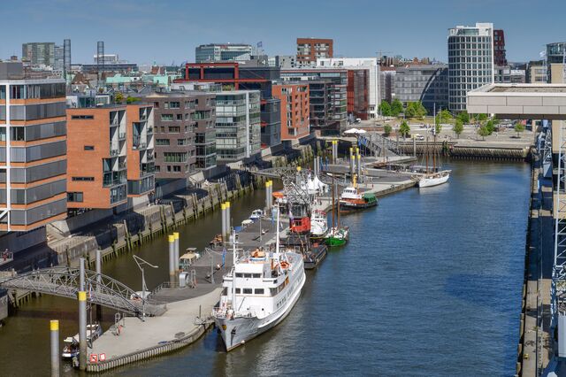 Hamburg’s HafenCity development is erecting homes, offices, and businesses on a stretch of disused dockland, building its streets and footpaths on a raised sandbank.