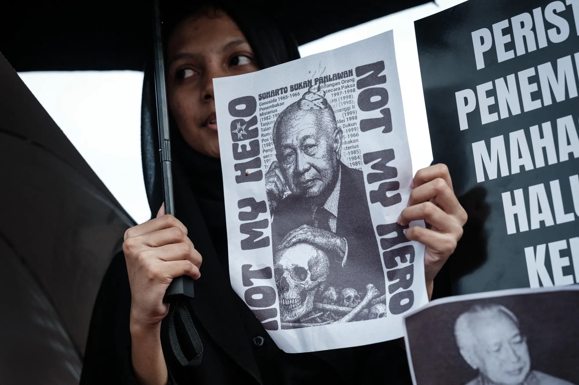 A poster reading "Not My Hero" during a rally opposing the Indonesian government's plan to grant former president Suharto a "National Hero" title in Jakarta on Nov. 6.