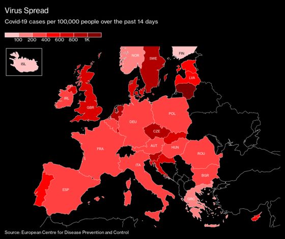 Merkel Pushes for Tighter Curbs With Vaccine Strategy Under Fire