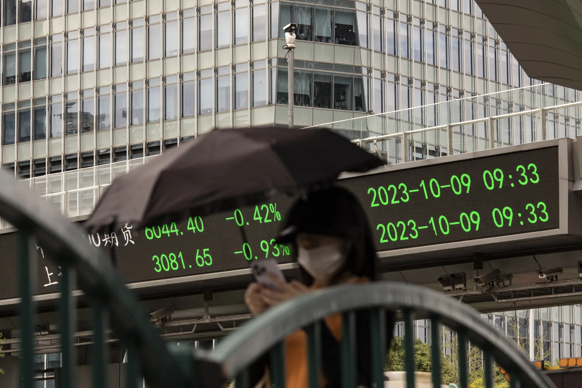 Stock figures in Pudong's Lujiazui Financial District in Shanghai.