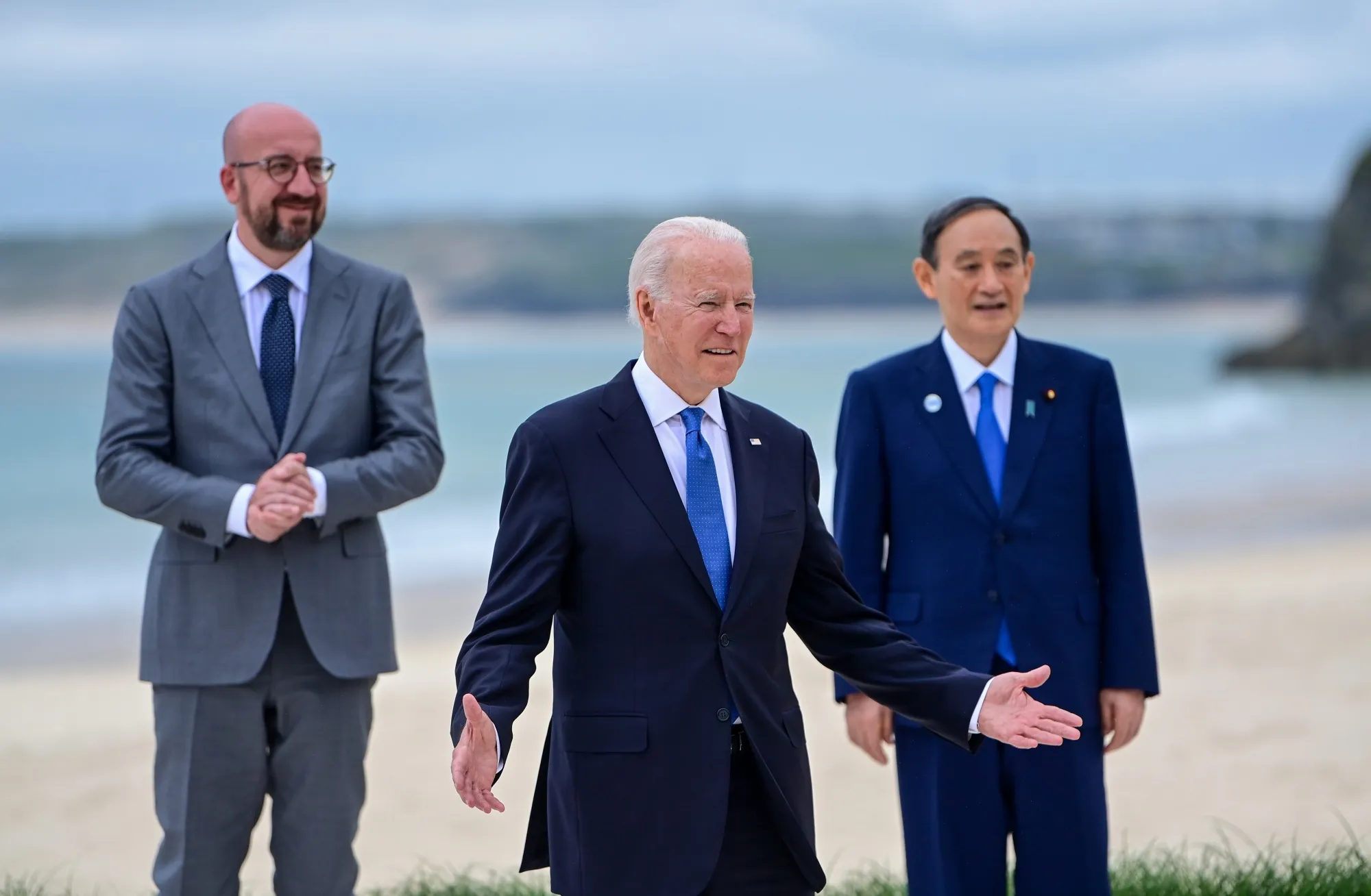 From left, Charles Michel, Joe Biden, and Yoshihide Suga attend the G-7 Leaders Summit in Carbis Bay, U.K. on June 11.