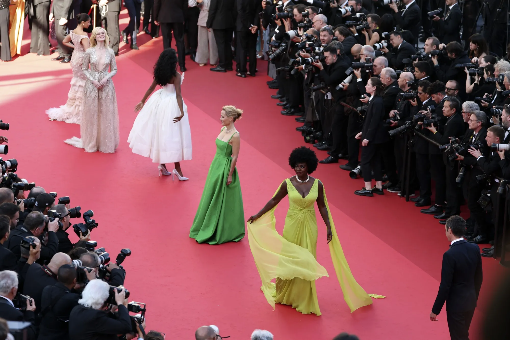 Elle Fanning, Simone Ashley, Gillian Anderson and Viola Davis attend the The Mastermind&nbsp;red carpet at the 78th annual Cannes Film Festival at Palais des Festivals on May 23.