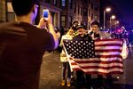 Hundreds celebrated on Hemingway Street in Boston's Fenway neighborhood after police announced the second bombing suspect's capture