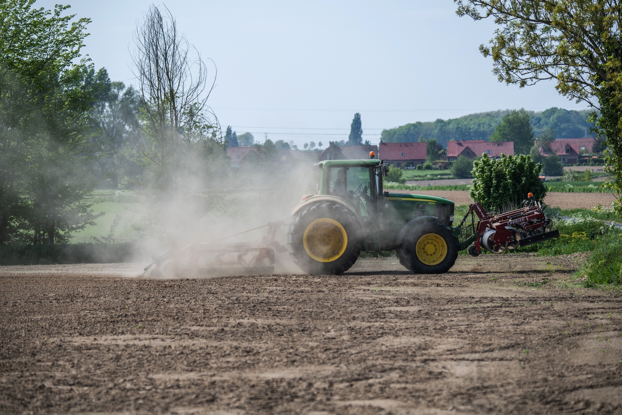 A tractor kicks up dust while ploughing a crop field during drought conditions,&nbsp;in Aisne, France, in April.