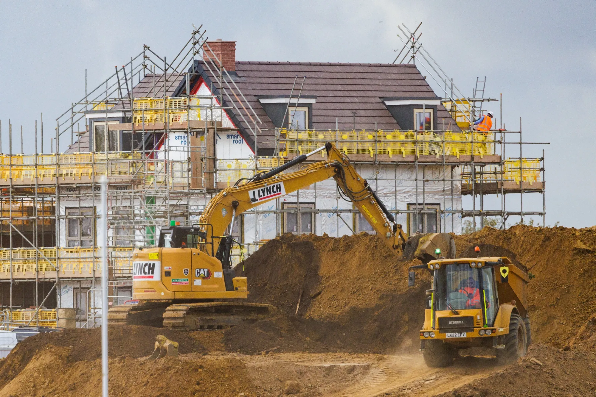 Building works at a Taylor Wimpey Plc residential construction site in Ockham.